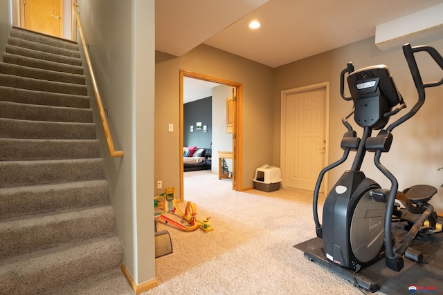 exercise room featuring carpet flooring