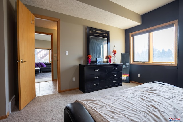 bedroom featuring light colored carpet