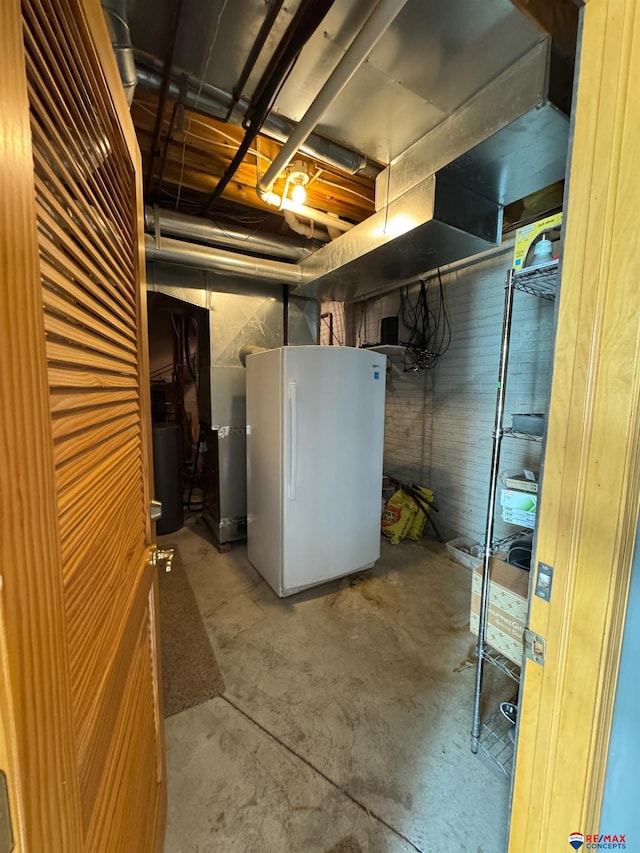 basement featuring fridge