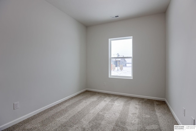 view of carpeted spare room