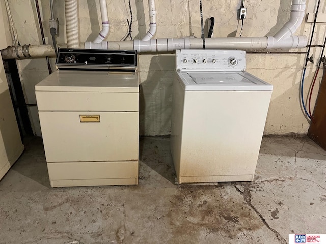 washroom with separate washer and dryer