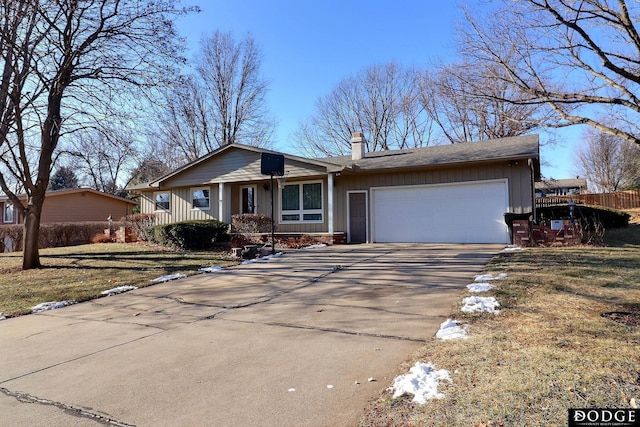 ranch-style house with a front yard and a garage