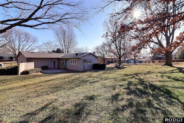 exterior space with a yard and a patio