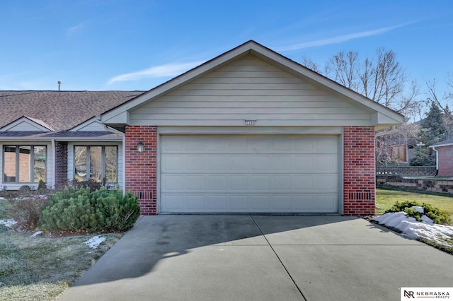 single story home featuring a garage