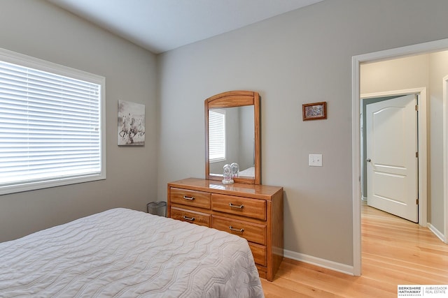 bedroom featuring light wood-type flooring