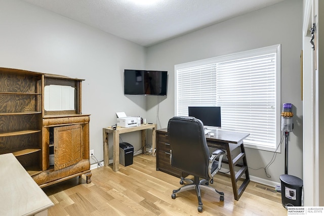 office area featuring light hardwood / wood-style flooring