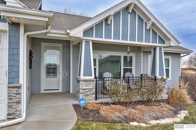 property entrance featuring covered porch