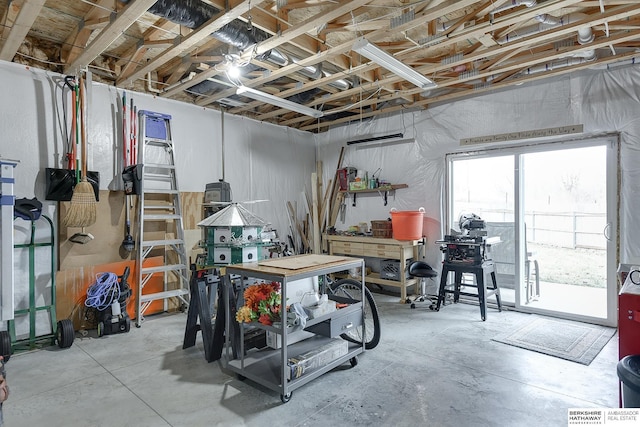 basement with a workshop area