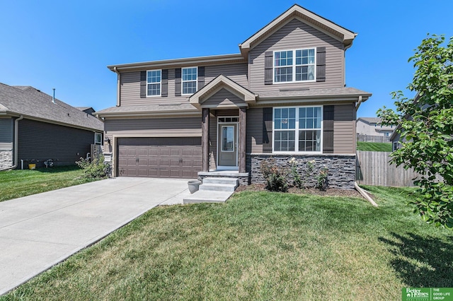 craftsman inspired home featuring a front yard and a garage