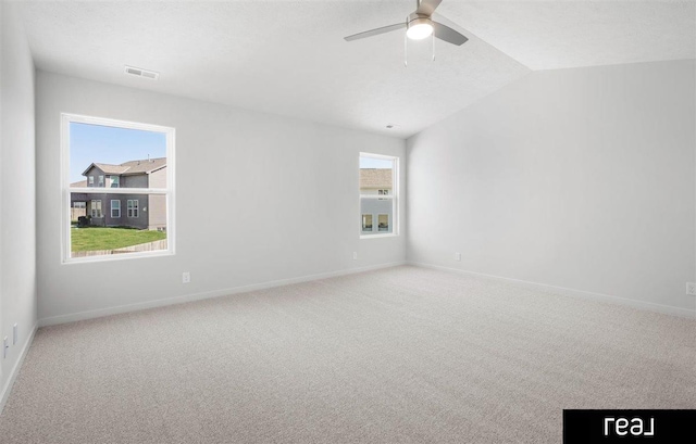 5508 Brook St, Papillion, NE 68133 - spare room with carpet flooring, a ceiling fan, baseboards, and vaulted ceiling