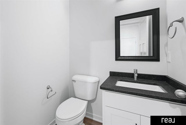 5508 Brook St, Papillion, NE 68133 - bathroom featuring vanity, toilet, and baseboards