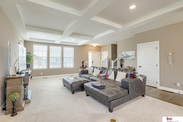 living room featuring beamed ceiling, light colored carpet, and coffered ceiling