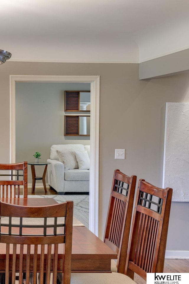 dining space featuring light wood-type flooring