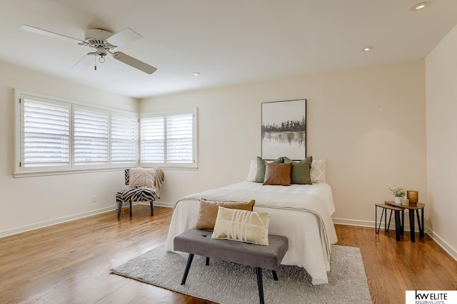 bedroom featuring ceiling fan and light wood-type flooring