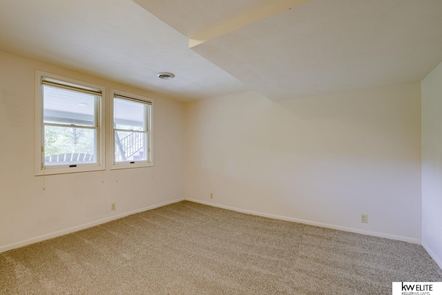 unfurnished room with carpet floors