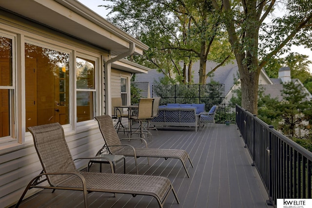 deck featuring an outdoor living space