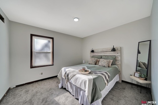 bedroom featuring light colored carpet