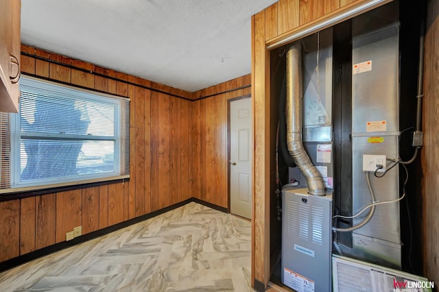 utility room with heating unit