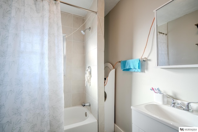 bathroom with vanity and shower / bath combo