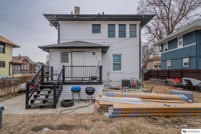 rear view of house featuring a patio