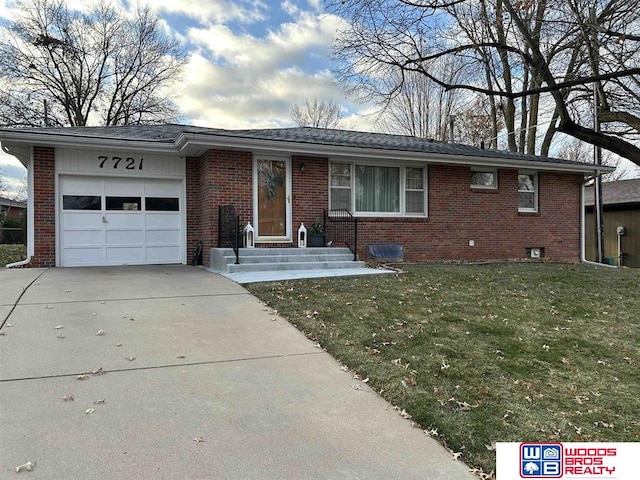 single story home featuring a front yard and a garage