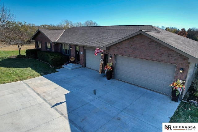 single story home with a garage