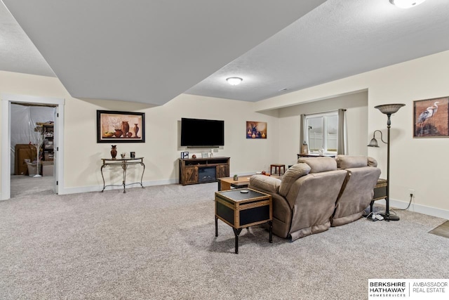 living room featuring light carpet and a textured ceiling