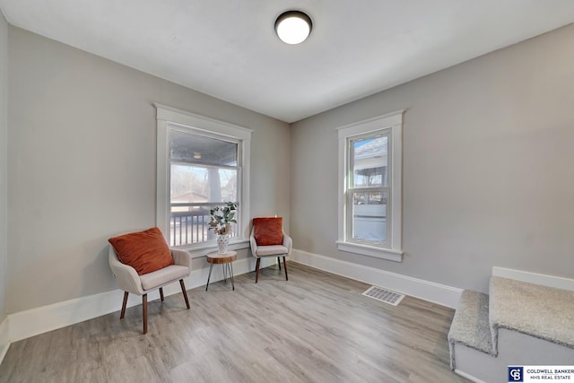 living area featuring light hardwood / wood-style floors