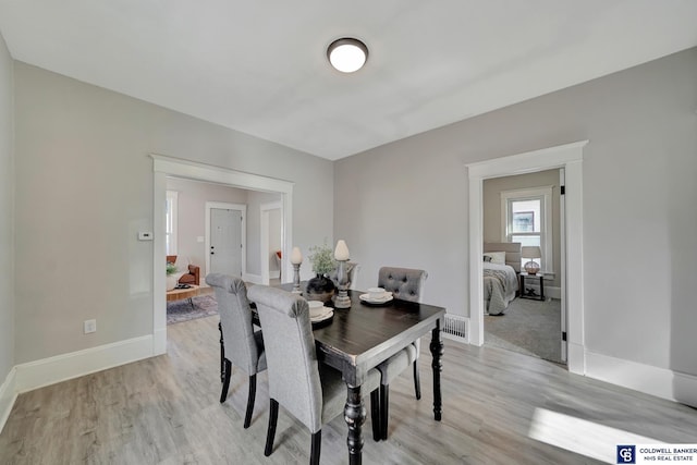 dining room featuring light hardwood / wood-style floors