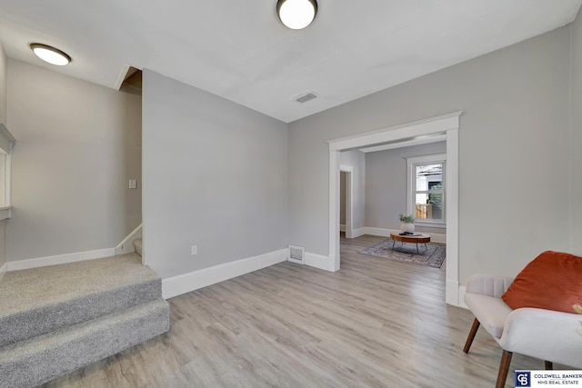 sitting room featuring light wood-type flooring