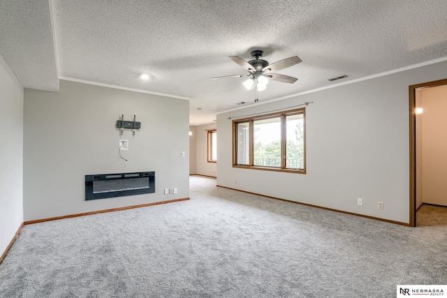 unfurnished living room with a textured ceiling, light carpet, ceiling fan, heating unit, and crown molding