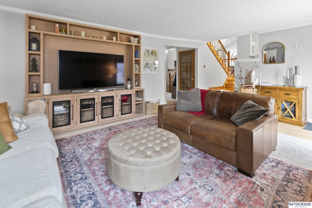 living room with ornamental molding