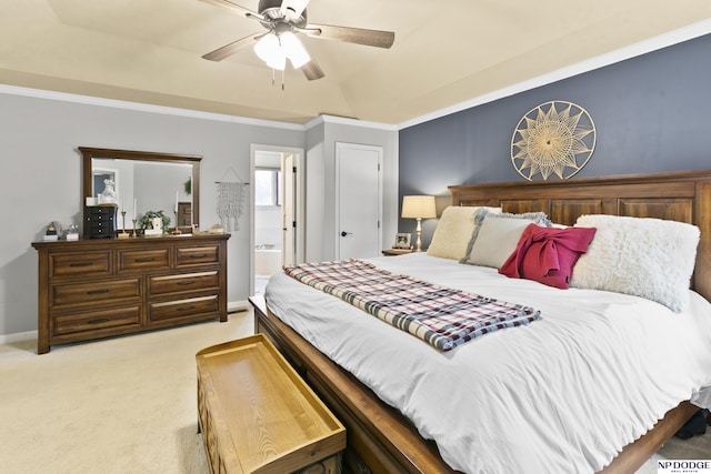 carpeted bedroom featuring connected bathroom, ceiling fan, and ornamental molding