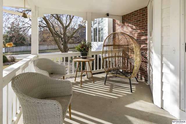 balcony featuring covered porch