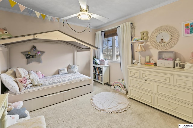 bedroom featuring light colored carpet, ceiling fan, and ornamental molding