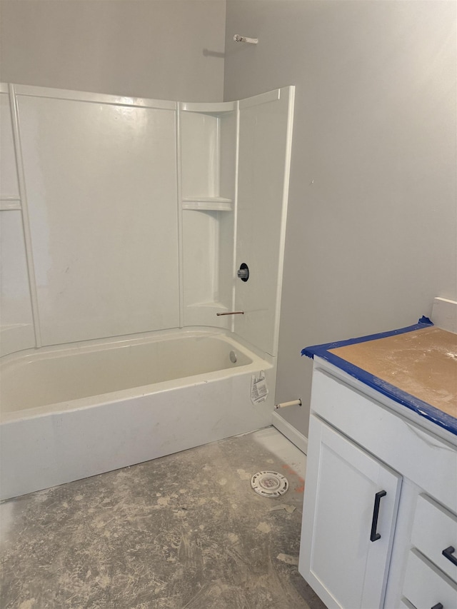 bathroom with vanity and shower / washtub combination