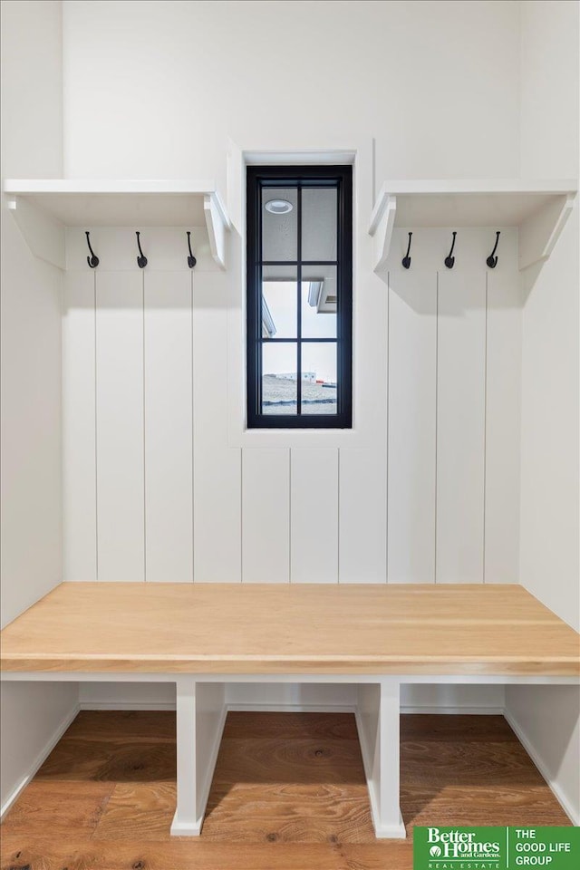 mudroom with wood finished floors