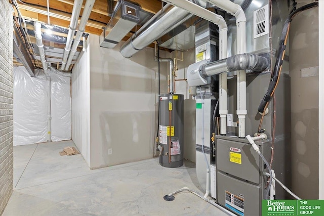 utility room featuring water heater