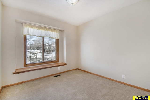 view of carpeted spare room