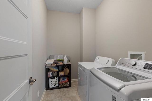 laundry area featuring independent washer and dryer