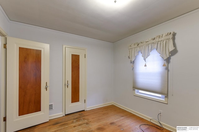 empty room with light hardwood / wood-style floors