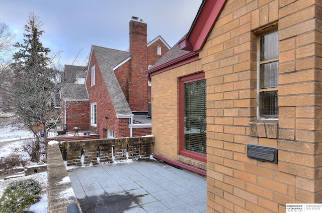 view of snow covered patio