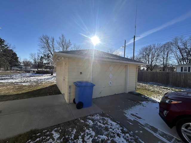 view of snow covered garage