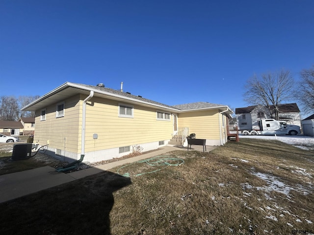 view of home's exterior with cooling unit