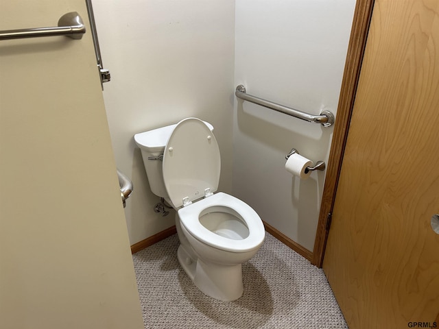 bathroom featuring toilet