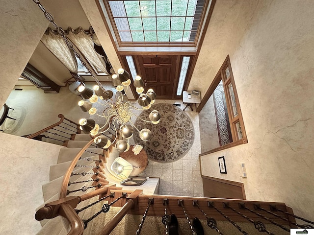 foyer entrance featuring a high ceiling