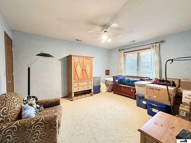 carpeted bedroom with ceiling fan