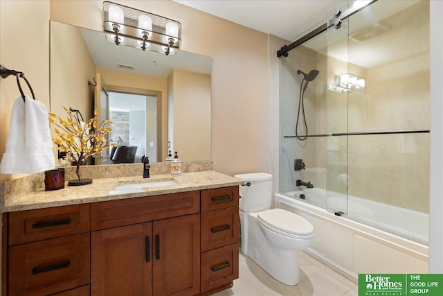 full bathroom with shower / bath combination with glass door, vanity, and toilet