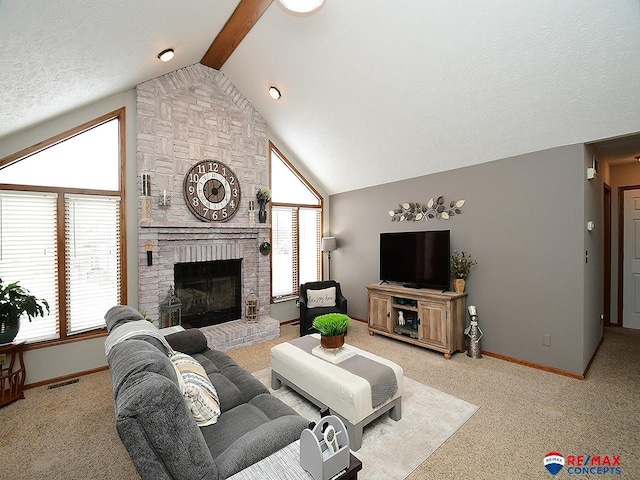 living room featuring vaulted ceiling with beams, a fireplace, and light carpet