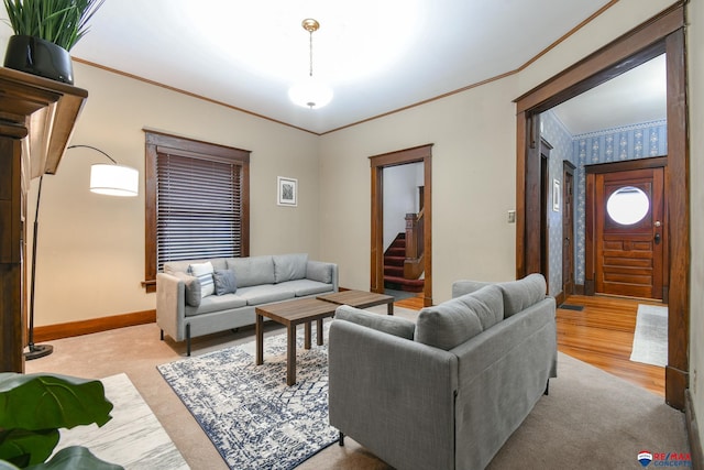 carpeted living room with crown molding